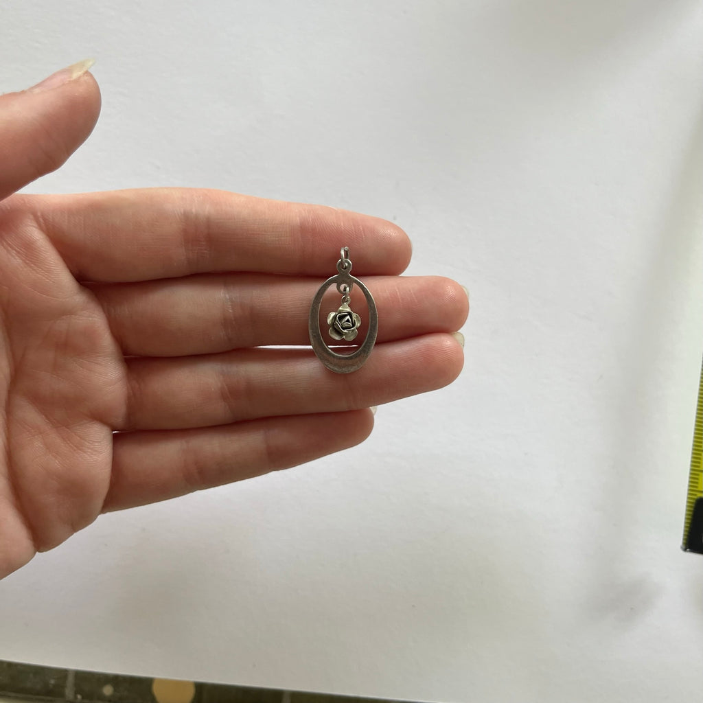 VINTAGE STERLING SILVER CUTOUT ROSE PENDANT