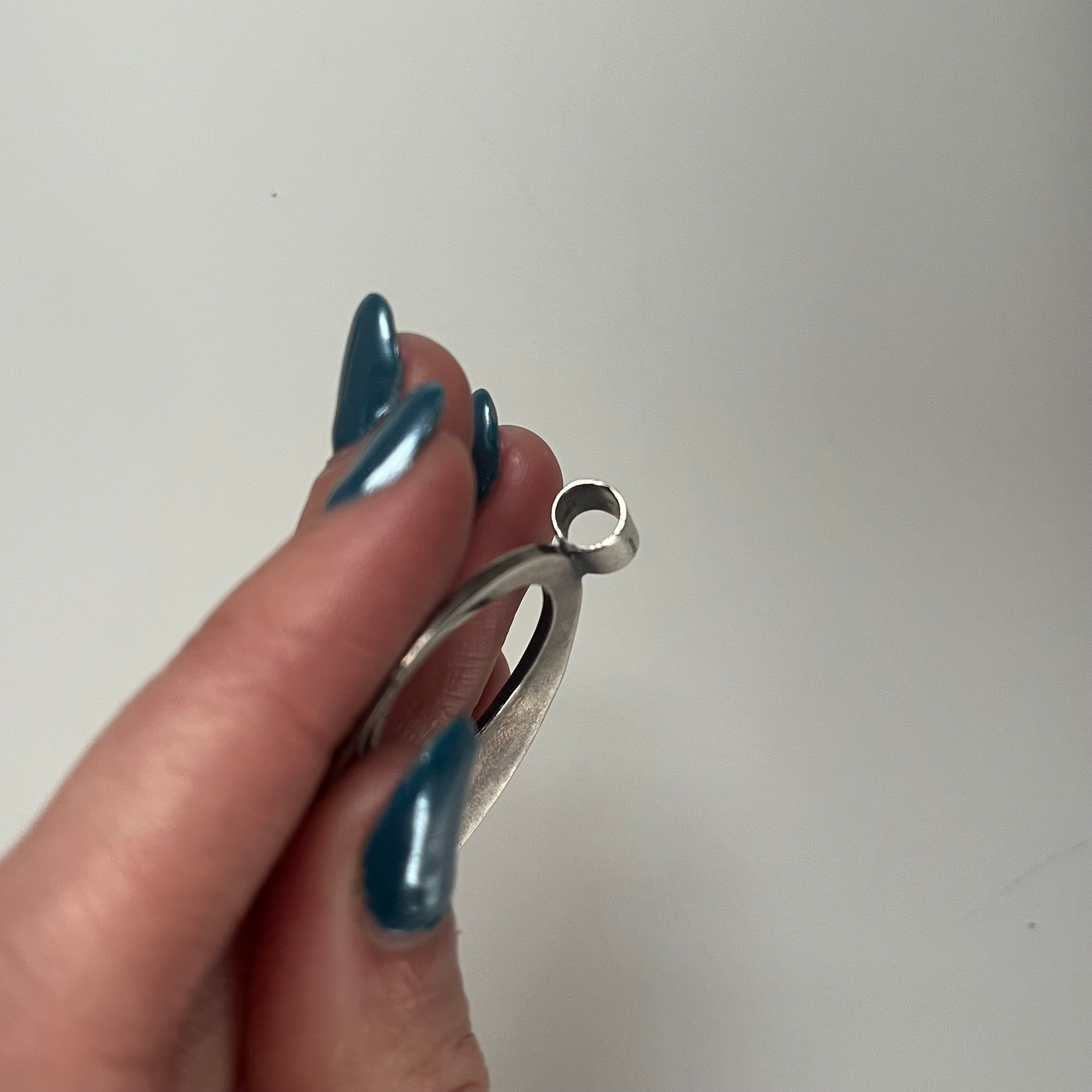 Vintage oval hammered cutout pendant