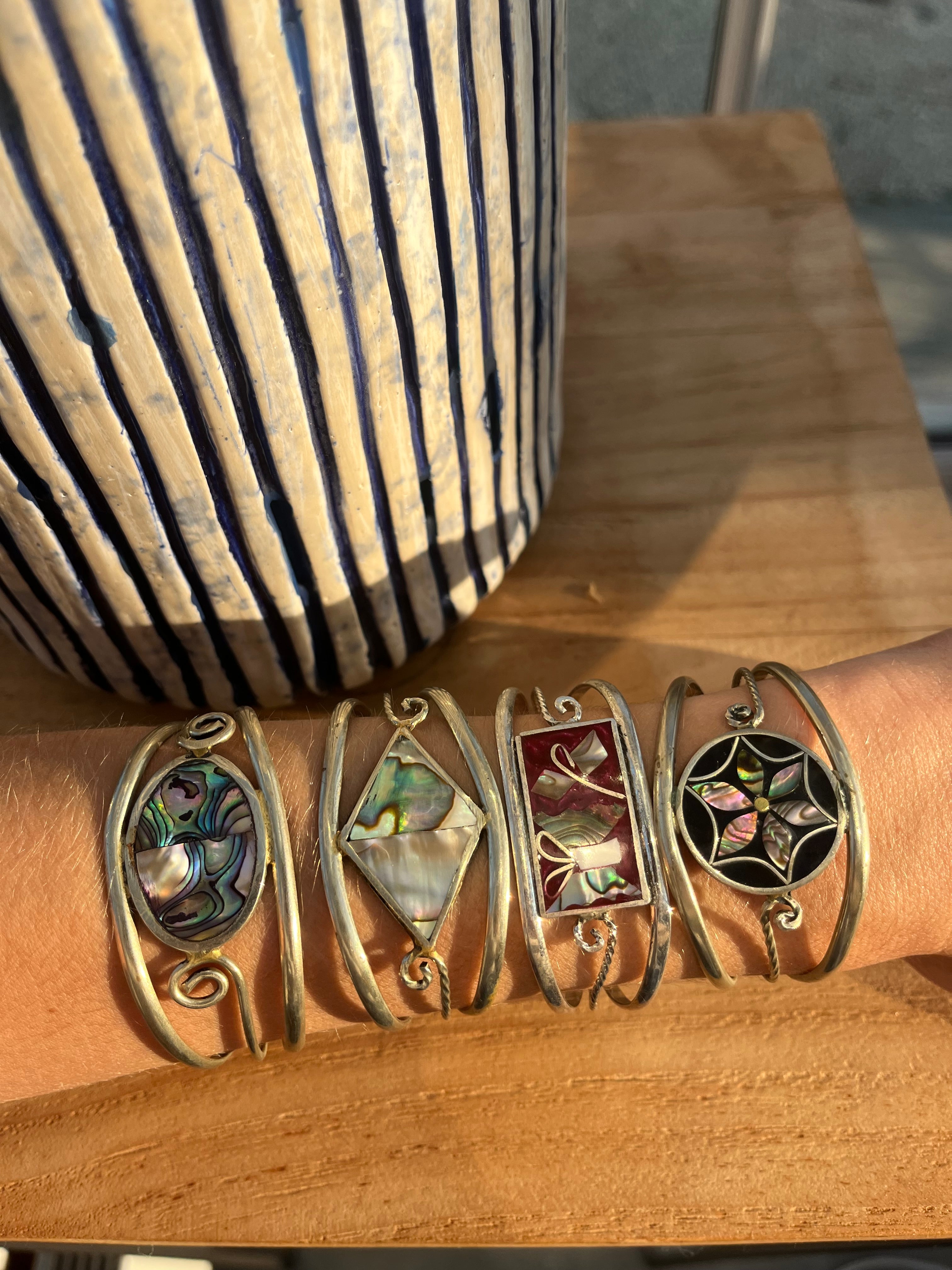 Vintage mother of pearl cuff bracelets