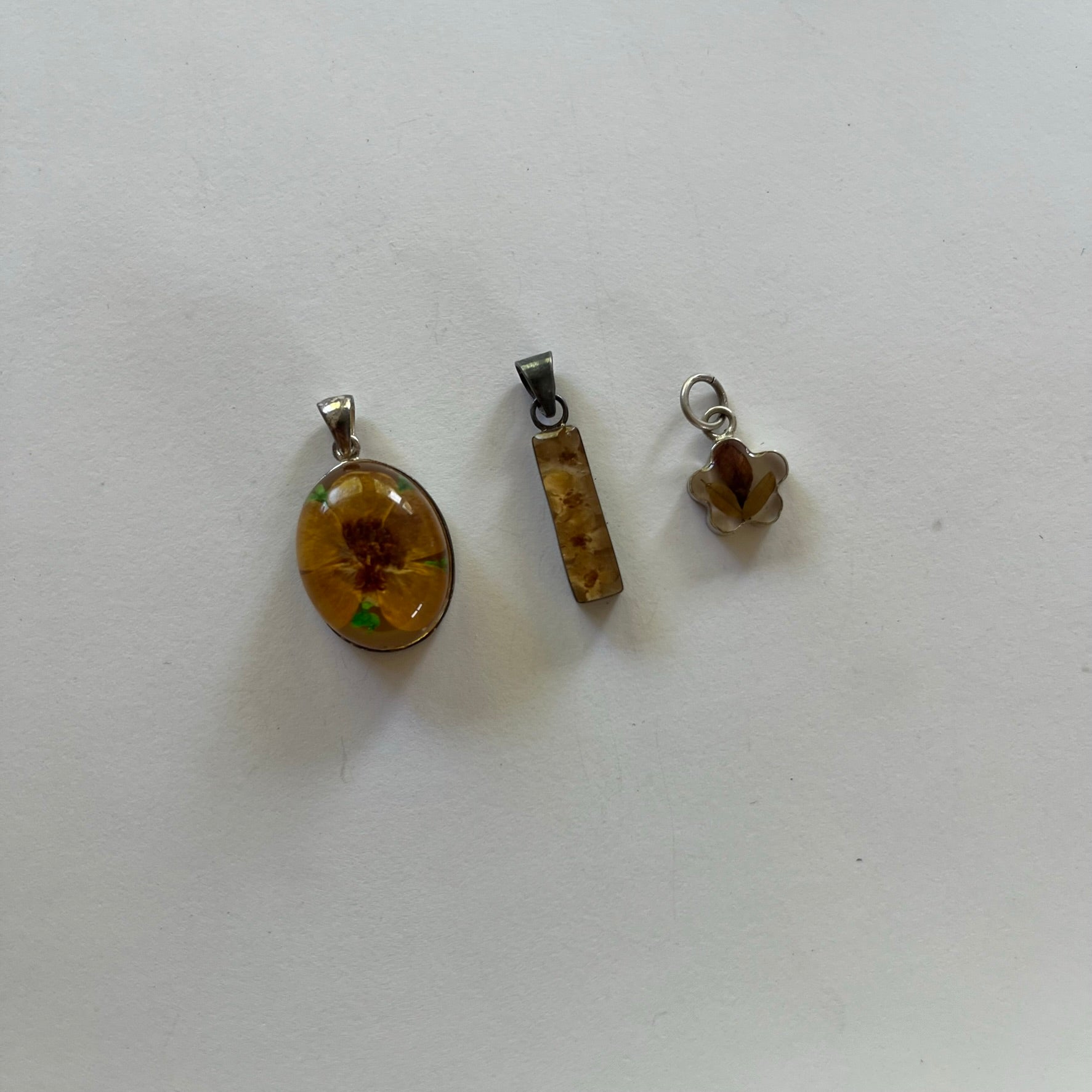 VINTAGE STERLING SILVER FLORAL RESIN PENDANTS