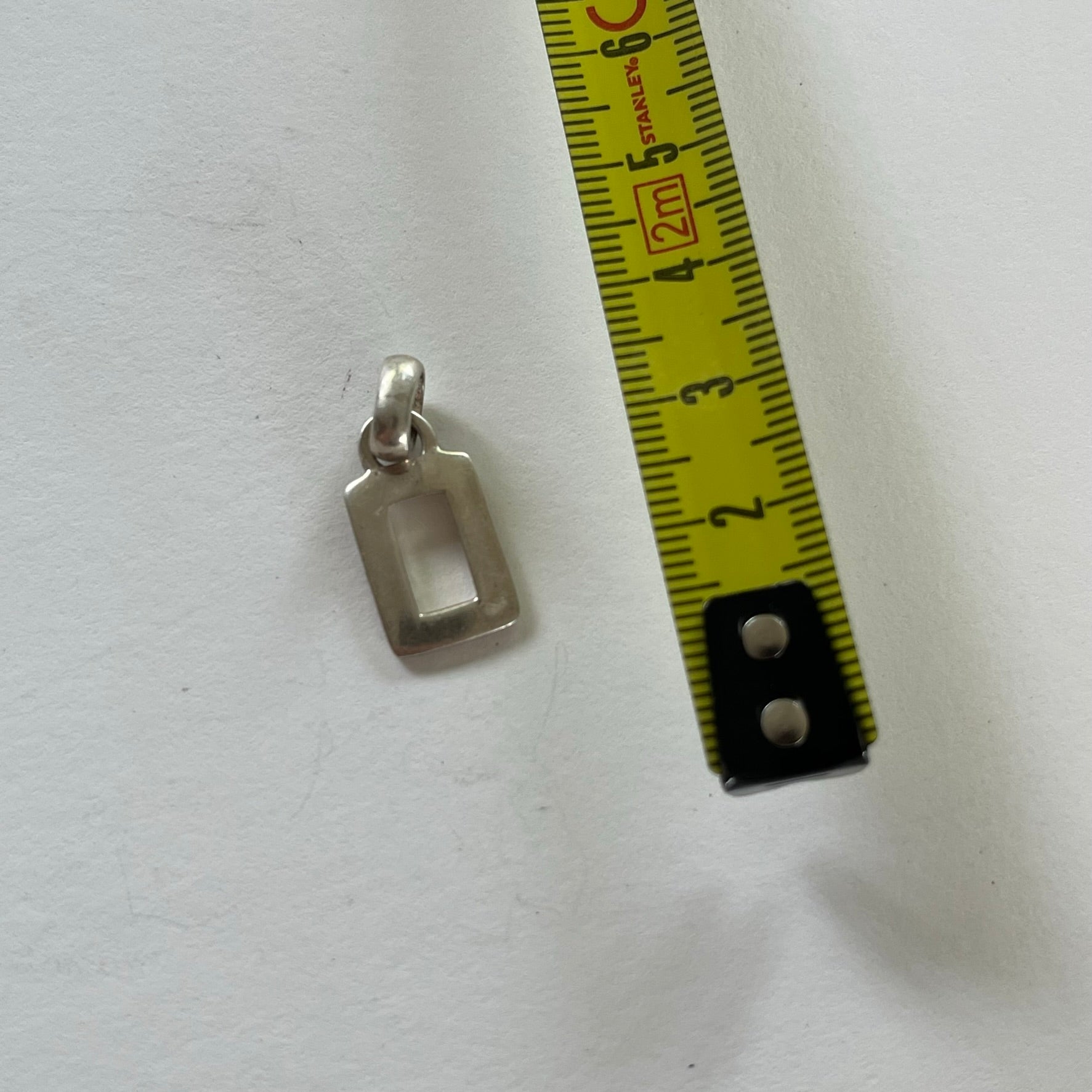 VINTAGE STERLING SILVER CUTOUT PENDANT
