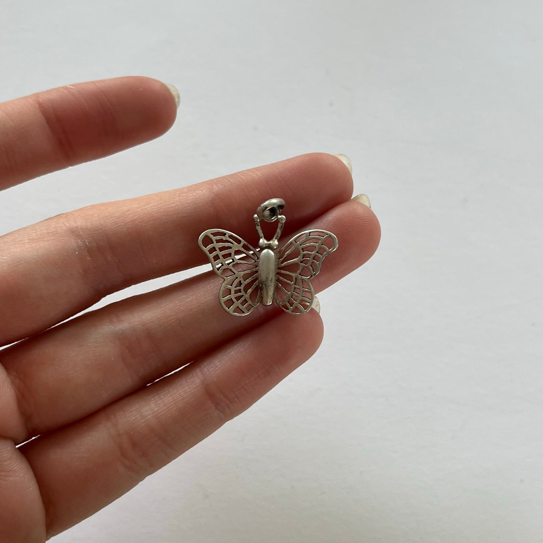 VINTAGE STERLING SILVER CUTOUT BUTTERFLY PENDANT
