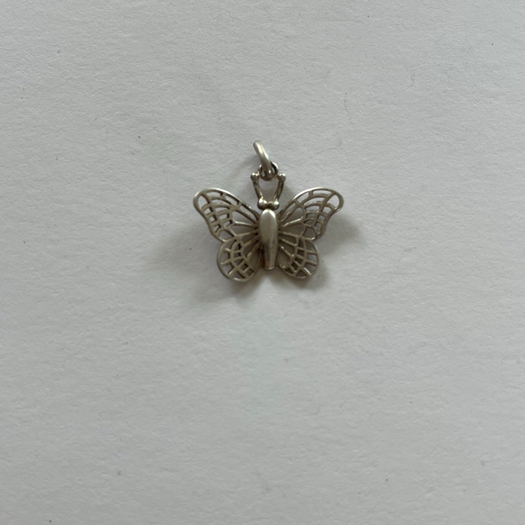 VINTAGE STERLING SILVER CUTOUT BUTTERFLY PENDANT