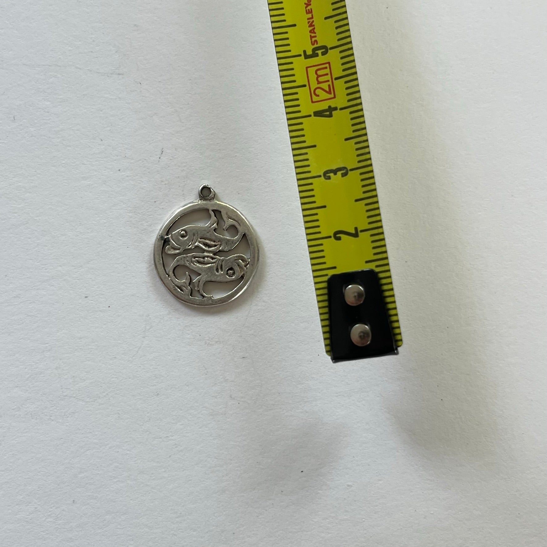 VINTAGE STERLING SILVER CUTOUT PISCES CHARM