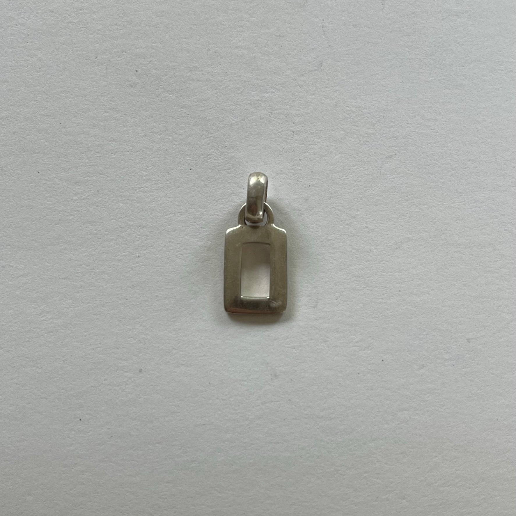 VINTAGE STERLING SILVER CUTOUT PENDANT
