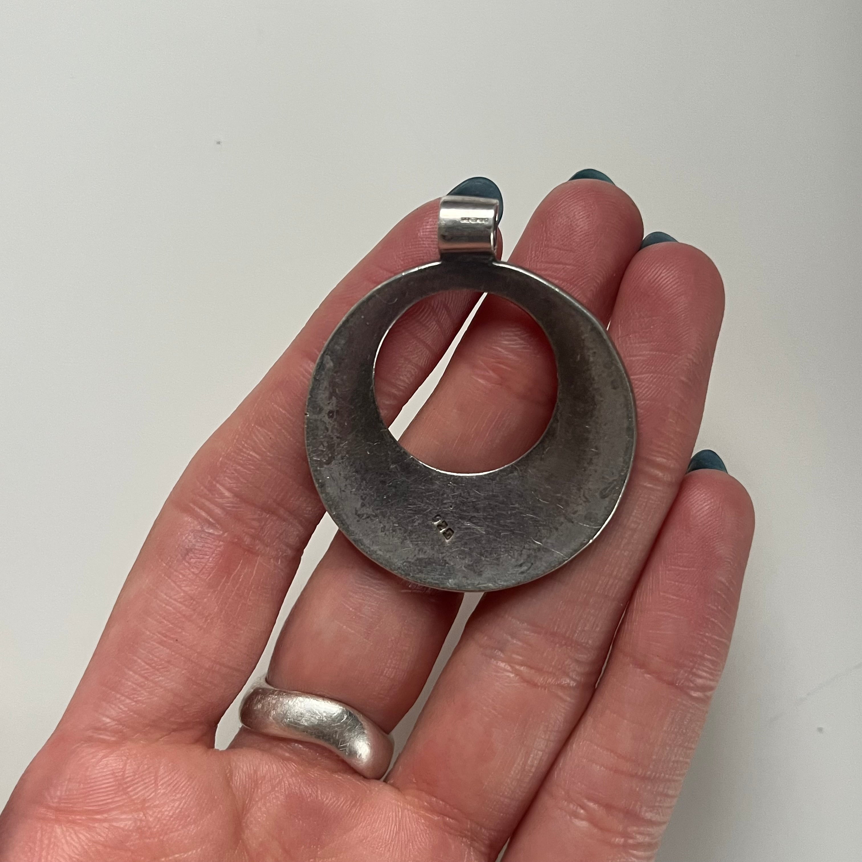 Vintage oval hammered cutout pendant