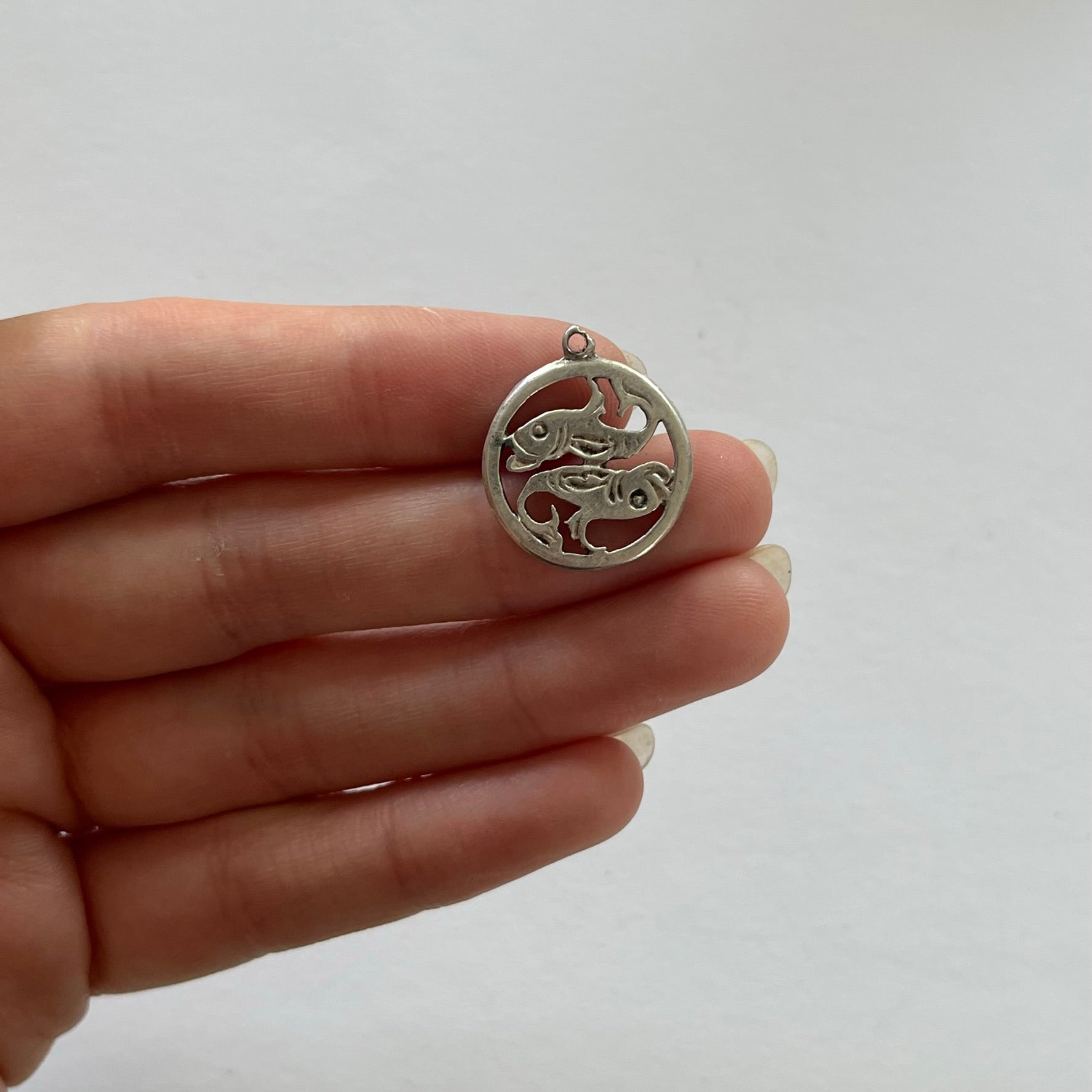 VINTAGE STERLING SILVER CUTOUT PISCES CHARM